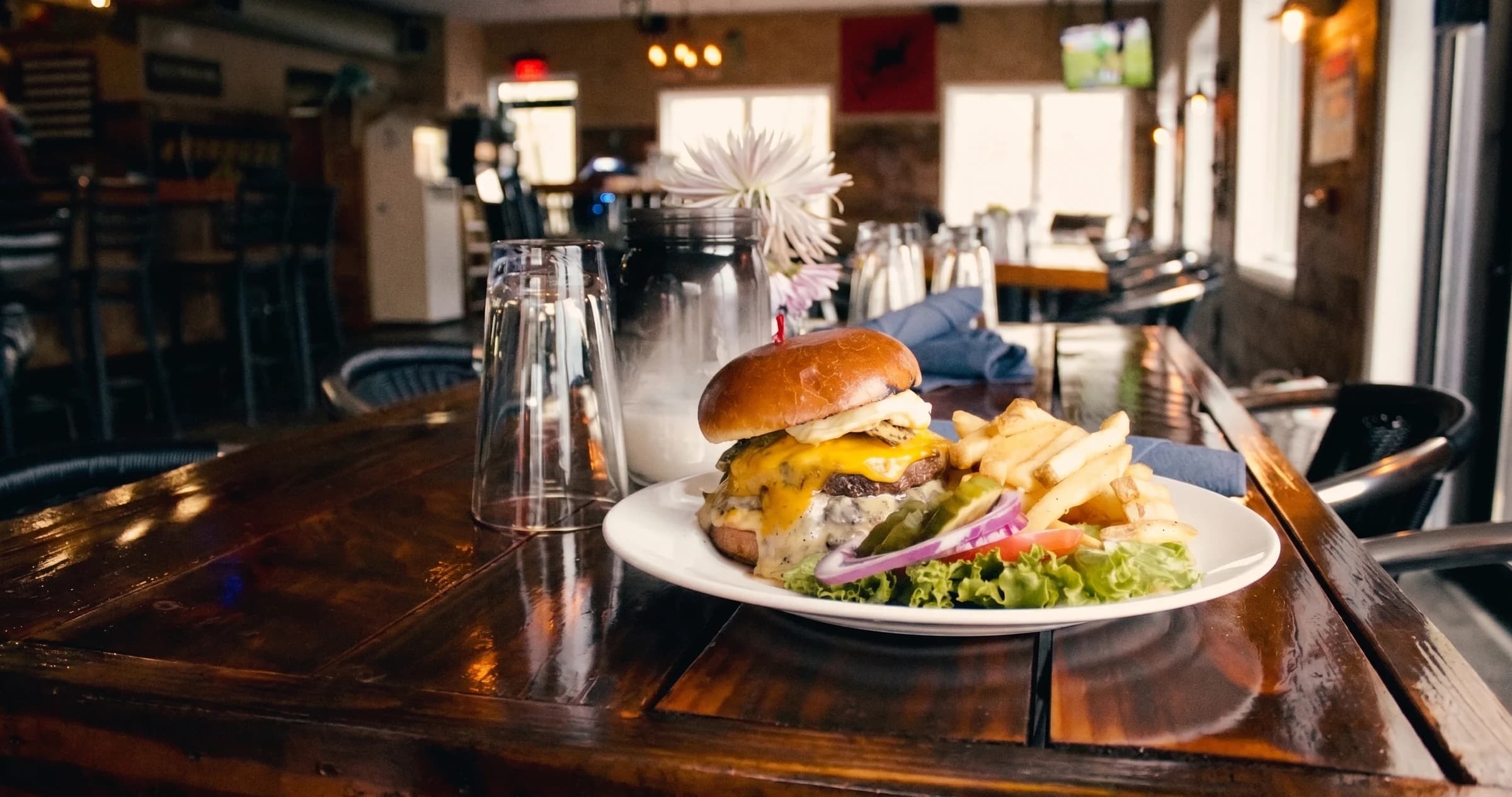 A fresh half-pound Angus burger from The Boat House Bar & Grill