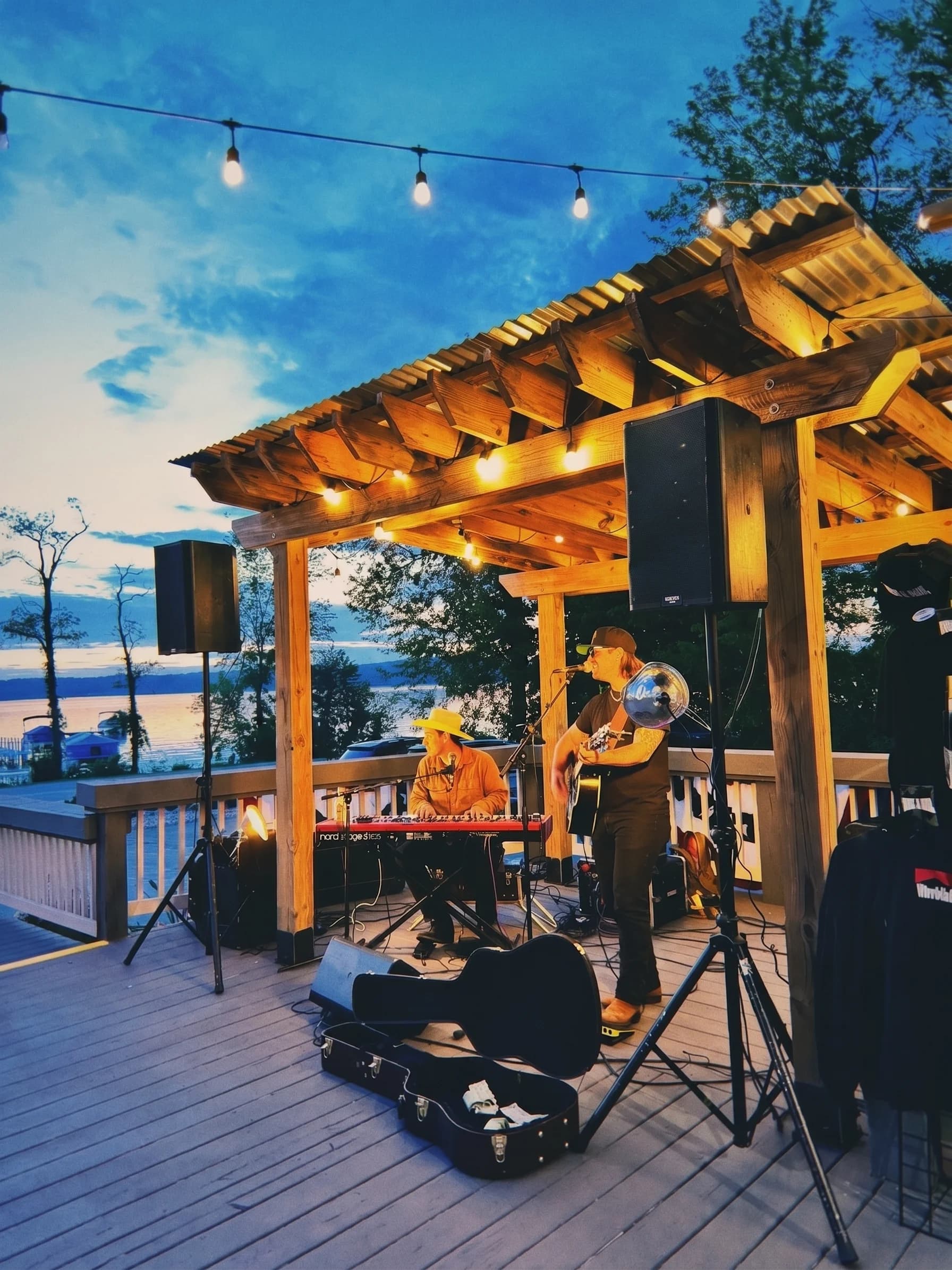 Live music under the pergola on the deck at The Boat House