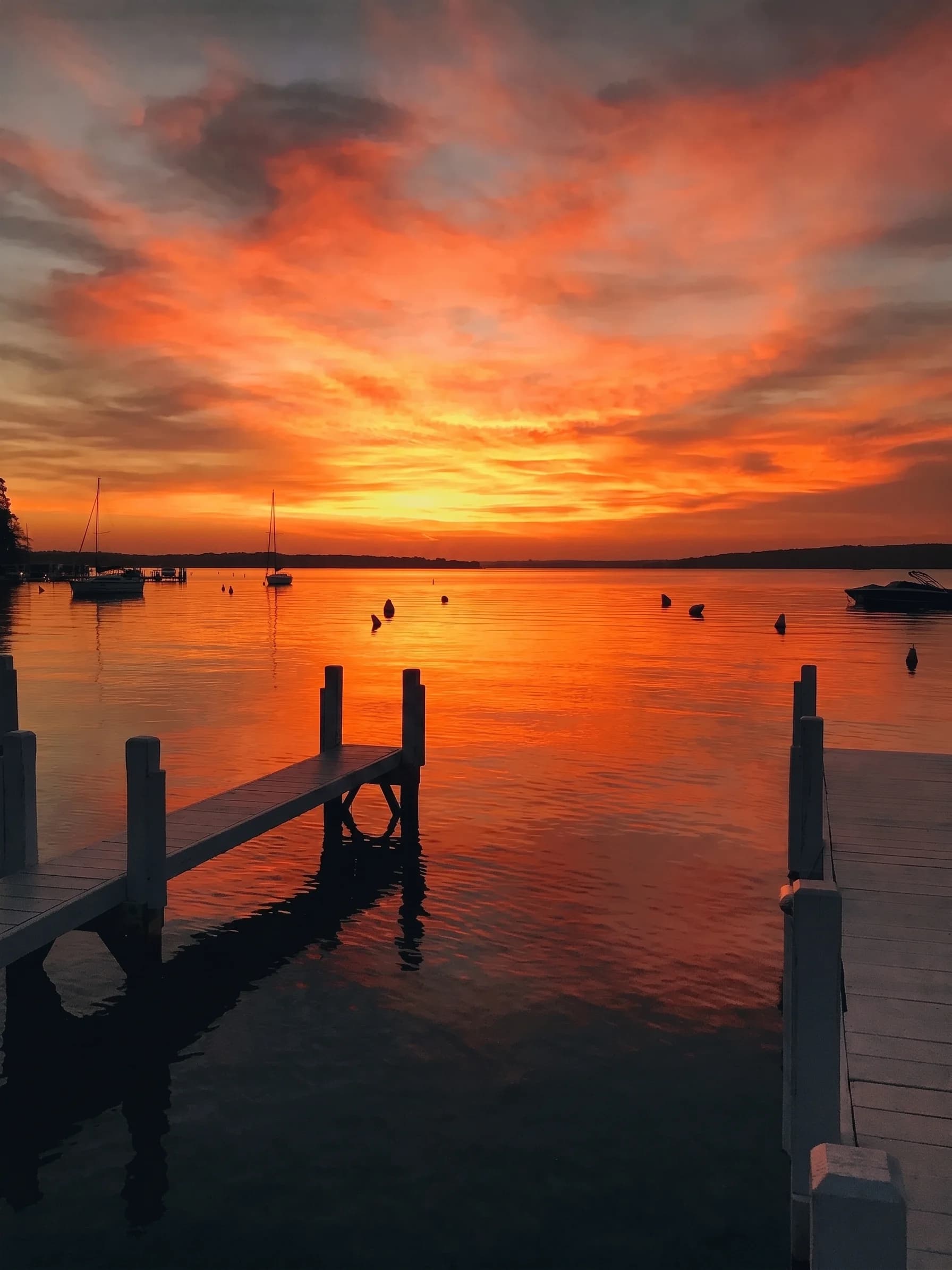Sunset over Geneva Lake from the deck at The Boat House Bar & Grill